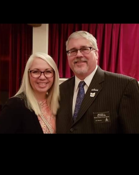 RWB Michael McClandish and his wife Becky smile