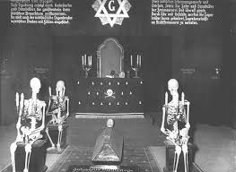 Skeletons dressed in traditional Masonic regalia are posed in an anti-Masonic exhibit fueling Nazi propaganda