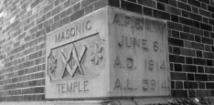 Traditional Masonic Cornerstone placed on the corner of a brick building