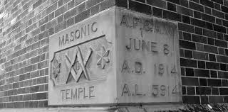 Traditional Masonic Cornerstone placed on the corner of a brick building