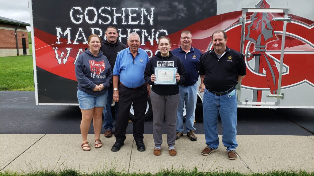 Masons of Ohio's J.B. Covert Lodge present a scholarship to a high school senior