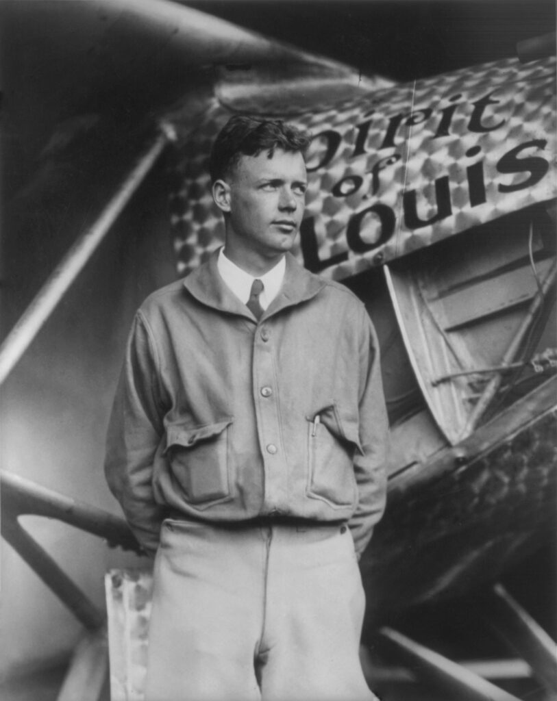 A photograph of Lindbergh with the Spirit of St. Louis