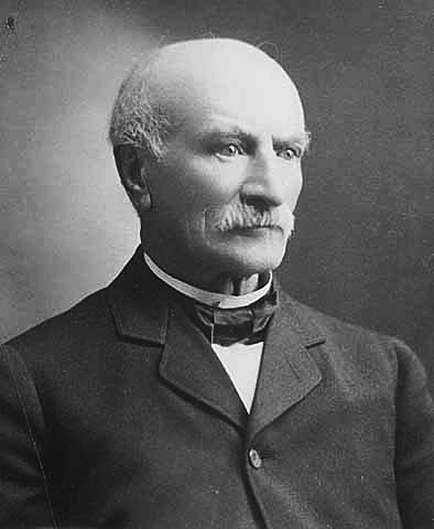 A black and white photo of Dr. William Worrall Mayo