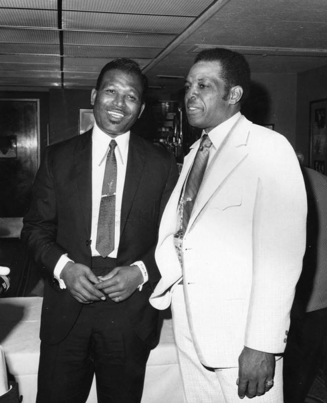 Robinson and baseball player Willie Mays