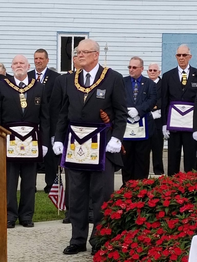 An image of Paul Weglage at an outdoor masonic ceremony.