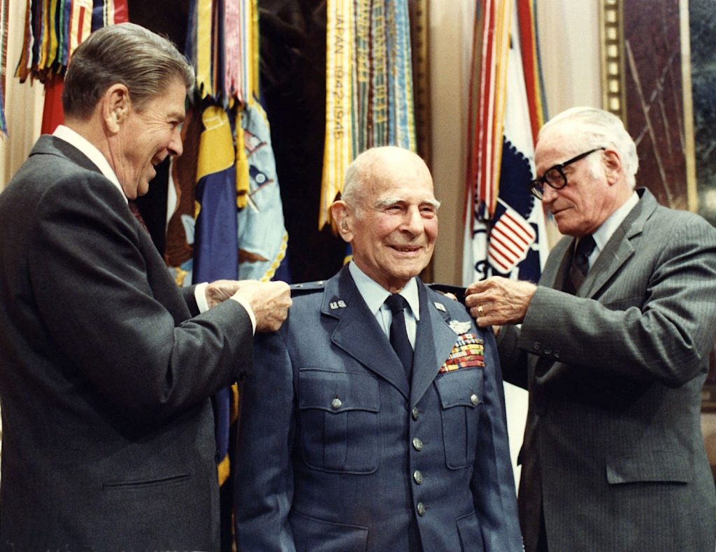 President Ronald Reagan and Senator Barry Goldwater award General Jimmy Doolittle with a fourth star